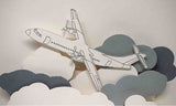 Carte blanche et grise en pop up pour un départ "bon voyage" motif avion et nuage