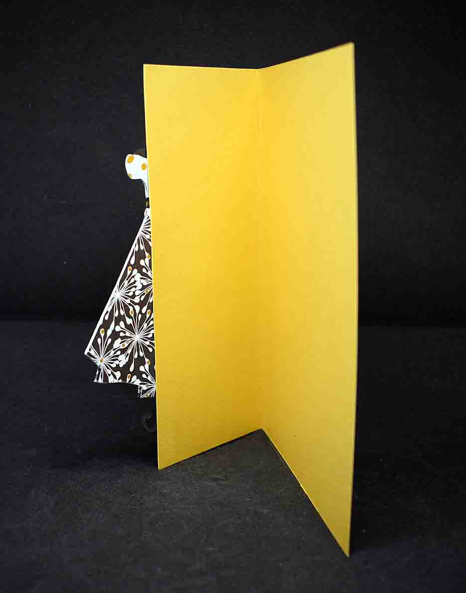 Carte pour anniversaire motif robe noire, dorée et blanche