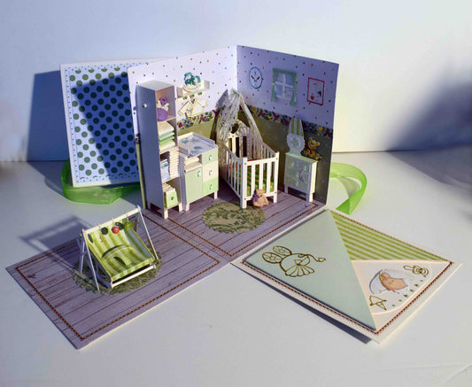 Boite cadeau de Naissance en papier et relief, chambre bébé avec transat portique d'éveil