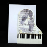 Carte d'anniversaire forme piano motif partition aux pointes de danseuses classiques