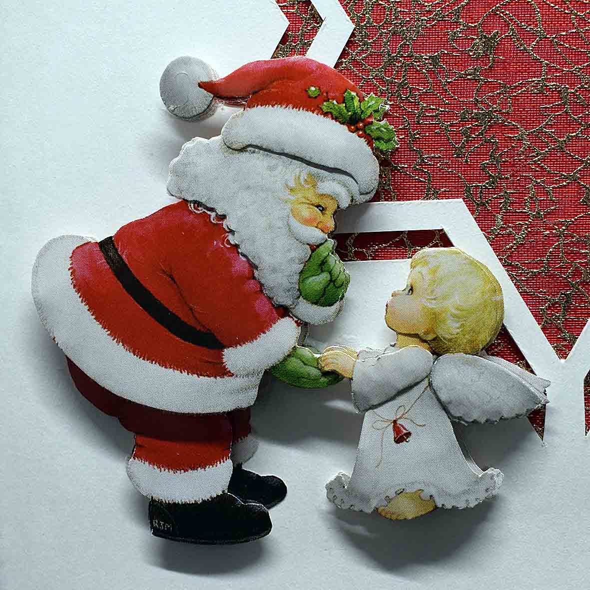 Carte de voeux Noël en 3D découpe étoilée rouge motif 3D père noel et ange