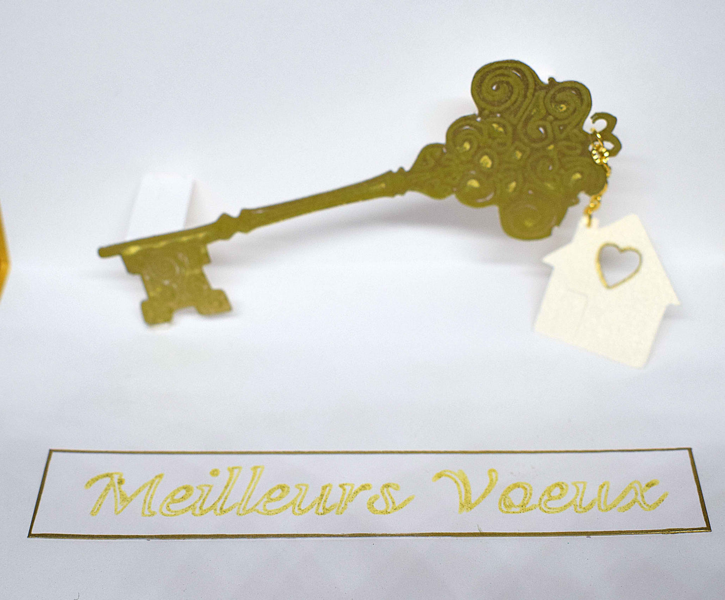 Carte de voeux en pop up, clé dorée