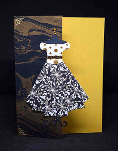 Carte pour anniversaire motif robe noire, dorée et blanche