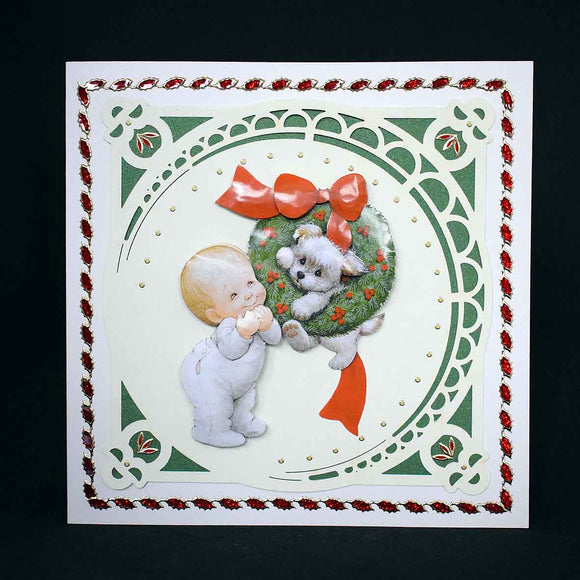 Carte de Noël en relief, découpe laser, enfant et chien à la couronne de noel