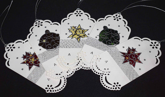 Etiquettes à cadeaux en relief "boules et étoiles de Noël"