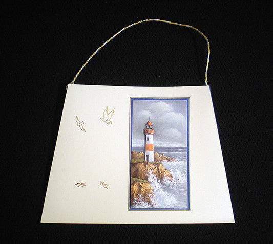 Carte sac d'anniversaire en relief au phare