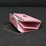 Petit sac à main rose motifs metalisé rose, chaine plaqué rose